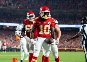 Emmett Johnson of the Kansas City Chiefs reacts after running with the ball against the Denver Broncos during an NFL football game at Arrowhead Stadium on Sept. 14, 2026, in Kansas City, Missouri.