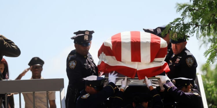 The casket of Army Sgt. Angel Rampersad is brought out of the Calvary Assembly of God church during a funeral service for the soldier who was killed in action on July 17 at Muwaffaq Salti Air Base in Jordan on July 31, 2026, in the Queens borough of New York City.