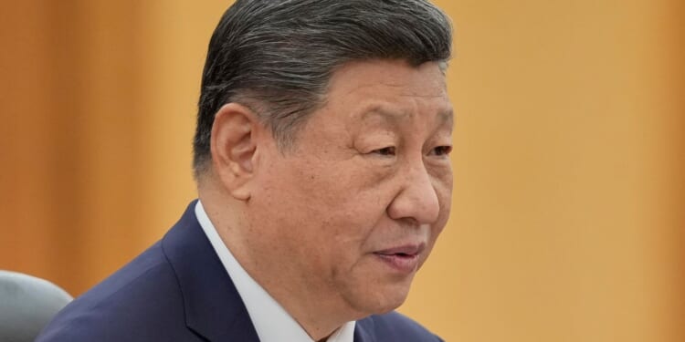 China expels 2 top military leaders accused of corruption from the ruling Communist Party