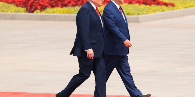 China's Xi kicks off state visit to Washington on Wednesday with a rare planeside welcome from Trump