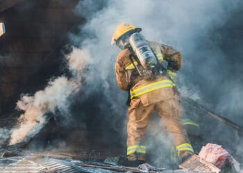 During a fire in Saint-Hugues, Quebec, on the evening of April 25, 2004, firefighters from the municipality as well as neighboring municipalities are battling the blaze.