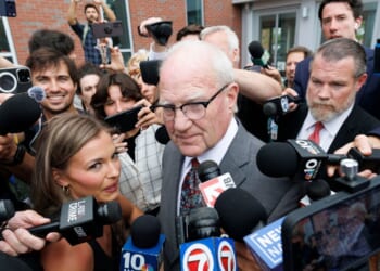 Defense attorney Kevin Reddington is surrounded by the media as he leaves the courthouse Thursday after Judge William Sullivan sent the jury home following the conclusion of deliberations for the sixth day in the trial of Lindsay Clancy at Plymouth County Superior Court in Plymouth, Massachusetts.