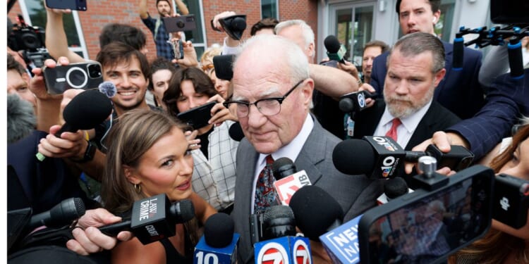 Defense attorney Kevin Reddington is surrounded by the media as he leaves the courthouse Thursday after Judge William Sullivan sent the jury home following the conclusion of deliberations for the sixth day in the trial of Lindsay Clancy at Plymouth County Superior Court in Plymouth, Massachusetts.