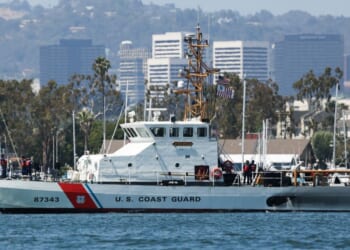 Personnel stand aboard the U.S. Coast Guard coastal patrol boat Tern as it maneuvers though the harbor in the Marina Del Rey community of Los Angeles county, on May 13, 2026.