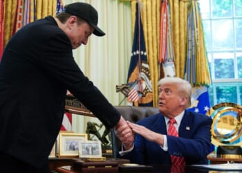 President Donald Trump shakes hands with Elon Musk in the Oval Office of the White House in Washington, D.C, in a file photo dated May 30, 2025.