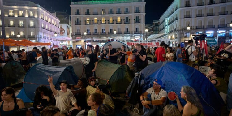 Eviction of 87-year-old sparks encampment protest in Madrid over housing crisis