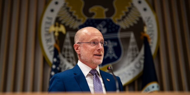 Federal Communications Commission commissioner Brendan Carr speaks during an open meting at the FCC headquarters in Washington on Feb. 18, 2026.