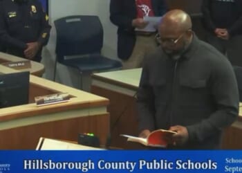 Pastor John K. Amanchukwu Sr. read an explicit school library book during a school board meeting in Hillsborough County, Florida, as shown in video he posted on Sept. 15, 2026.