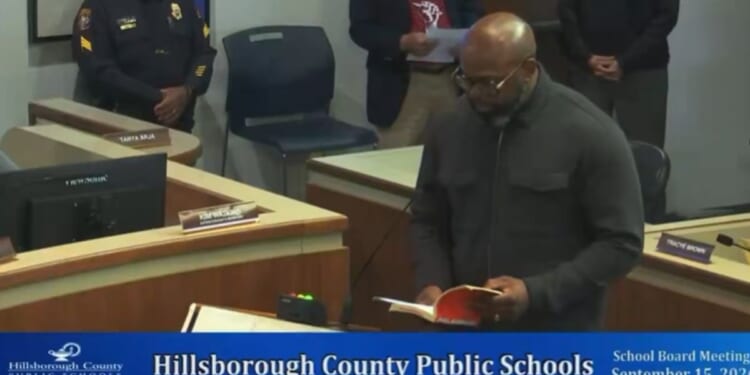 Pastor John K. Amanchukwu Sr. read an explicit school library book during a school board meeting in Hillsborough County, Florida, as shown in video he posted on Sept. 15, 2026.