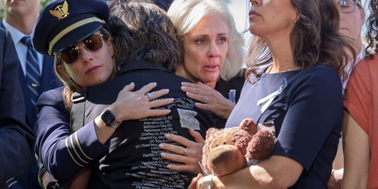 Families of the 67 who died in last year's midair collision want reforms to prevent the next tragedy