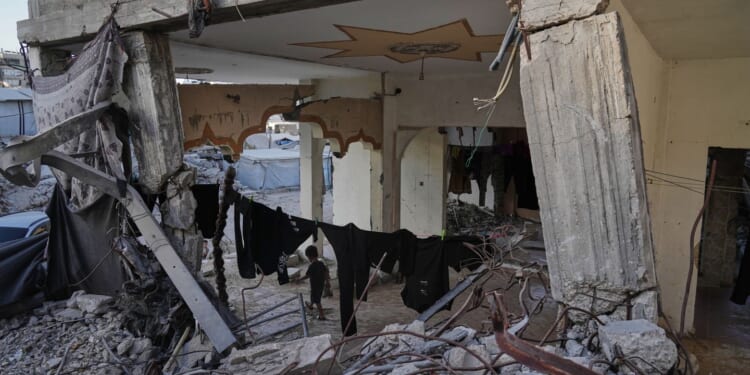 Fatal building collapse highlights dangers plaguing Gaza nearly a year after ceasefire