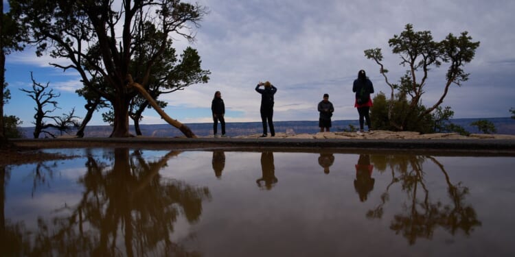 Grand Canyon flooding shuts down tourist lodging, threatens economy after last year's fire