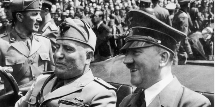 Adolf Hitler and Benito Mussolini riding in an open car in the 1940s.