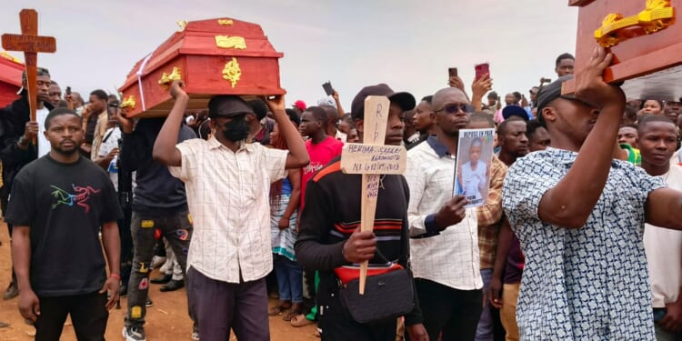 Hundreds gather in eastern Congo to mourn victims of school fires