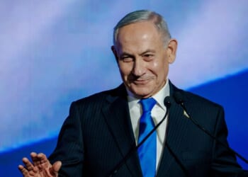 Israeli Prime Minister and Likud party leader Benjamin Netanyahu speaks to supporters at the lectern during a party campaign rally at Expo Tel Aviv on Sept. 17, 2026, in Tel Aviv, Israel.