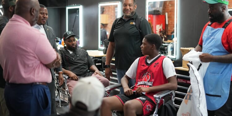 Inside a Philadelphia barbershop, Black men debate their political past and future
