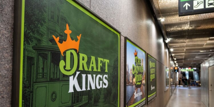 DraftKings advertisements line a passageway inside Embarcadero BART and Muni Metro station in San Francisco, California, on Aug. 27, 2026.