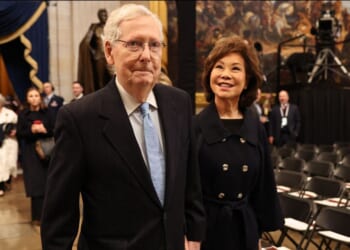 U.S. Republican Senator Mitch McConnell walks alongside his wife Elaine Chao at the inauguration of President-elect Donald Trump at the U.S. Capitol on Jan. 20, 2025 in Washington.
