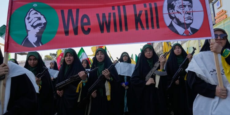 Iran says it has new weapons, threatens to 'change the geography of the war' if Trump orders attacks