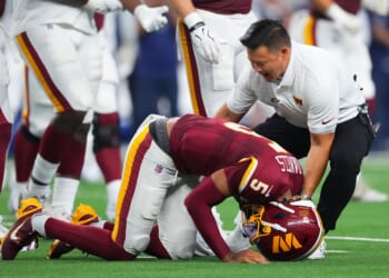 Jayden Daniels suffers dislocated elbow vs. Cowboys: What we know about the injury and timeline