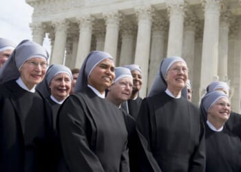 Loraine Marie Maguire, mother provincial of the Little Sisters of the Poor, stands alongside fellow nuns following oral arguments in seven cases dealing with religious organizations that want to ban contraceptives from their health insurance policies on religious grounds at the Supreme Court in Washington, D.C., on March 23, 2016.