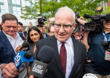 Lindsay Clancy's defense attorney Kevin Reddington speaks to reporters as he exits the courthouse Aug. 27 during Clancy's murder trial in Plymouth, Massachusetts.