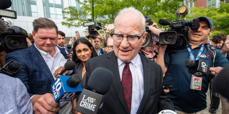 Lindsay Clancy's defense attorney Kevin Reddington speaks to reporters as he exits the courthouse Aug. 27 during Clancy's murder trial in Plymouth, Massachusetts.