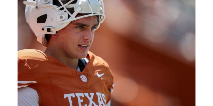 Arch Manning #16 of the Texas Longhorns warms up before the game against the Texas State Bobcats at Darrell K Royal-Texas Memorial Stadium on Sept. 5 in Austin, Texas.