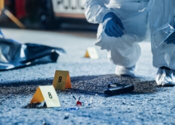 Stock photo shows a crime scene investigation. Police are investigating a mass shooting in Minneapolis Wednesday that left at least one person dead.