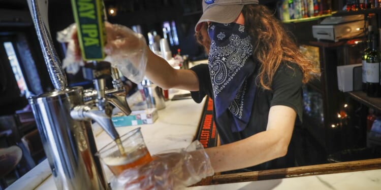 Massachusetts lesbian bar faces boycott after easing Saturday mask rule
