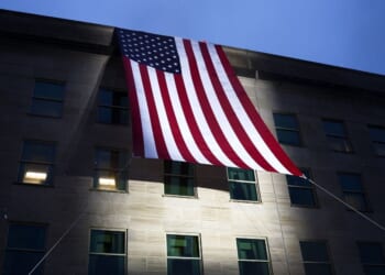 An American flag is unfurled on the side of the Pentagon to mark the 25th anniversary of 9/11 on Sept. 11, 2026, in Arlington, Virginia.