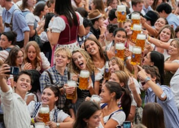 Munich's Oktoberfest roars to life as the mayor taps the first keg