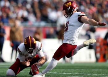 Joey Slye #6 of the Washington Commanders kicks a field goal during the first quarter in the game against the New England Patriots at Gillette Stadium on November 5, 2023, in Foxborough, Massachusetts.