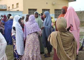 Nigerian police use tear gas during protests over the deaths in custody of 37 miners