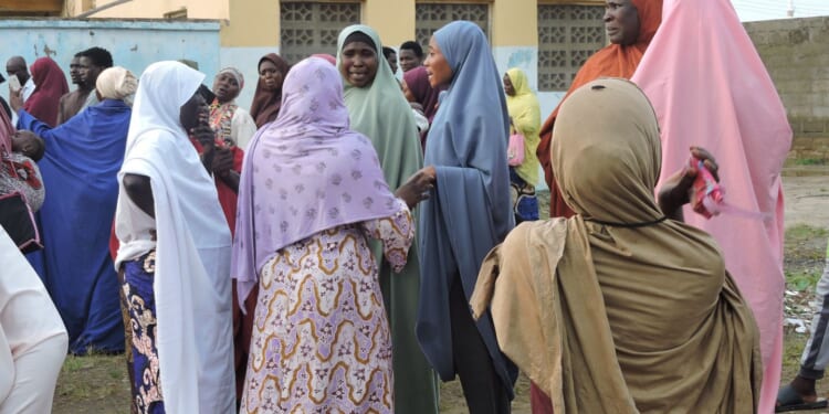 Nigerian police use tear gas during protests over the deaths in custody of 37 miners