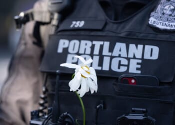 Portland women's sports bar clash draws police after 'XX-XY' shirt dispute