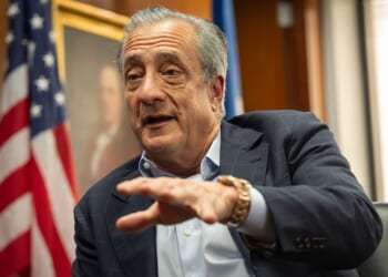 Postal Service chief says work stopped on computer system key to Trump effort to limit mail voting