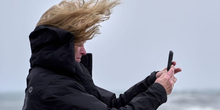 Powerful nor'easter floods Northeast, leaves over 130,000 without power as high tides threaten coast
