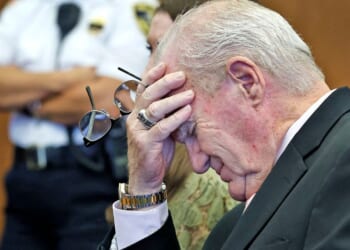 Kevin Reddington, the defense attorney for Lindsay Clancy, holds his head in his hand at Plymouth County Superior Court in Plymouth, Massachusetts, on Sept. 4, 2026.