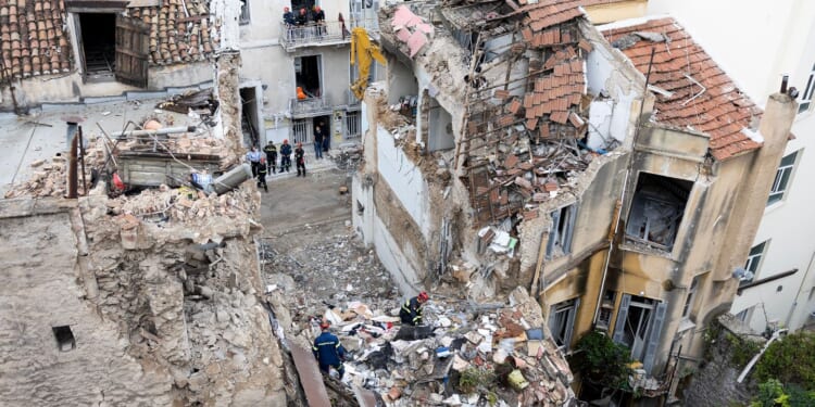 Rescuers pull 4 unconscious from collapsed building near the Acropolis in Greece