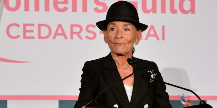 Judge Judy Sheindlin, pictured on stage during the Women's Guild Cedars-Sinai Spring luncheon at The Beverly Hills Hotel in May 2025.