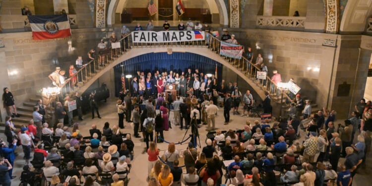 Activists gather to protest against a plan to redistrict Missouri maps ahead of the 2026 midterm elections in Jefferson City, Missouri, on Sept. 10, 2025.