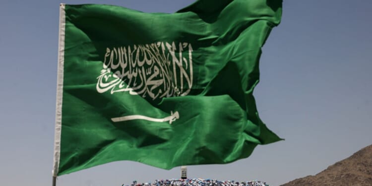 A Saudi Arabian flag flies on June 5, 2026 on Mount Arafat.