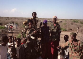 Somali Salvation Democratic Front fighters move in their military vehicle on March 24, 1991, in Bufo, 85 kilometers from Mogadishu. President Siad Barre fled the country in late January 1991.