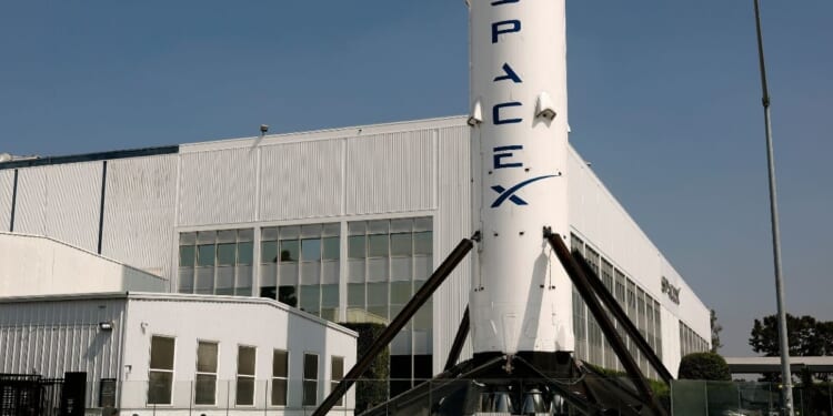 A SpaceX Falcon 9 rocket is displayed at a SpaceX facility on Aug. 4, 2026, in Hawthorne, California.