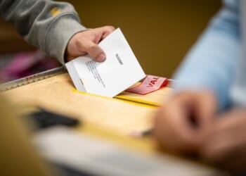 Swedish voters go to polls to choose a new parliament as hard right bids for role in government