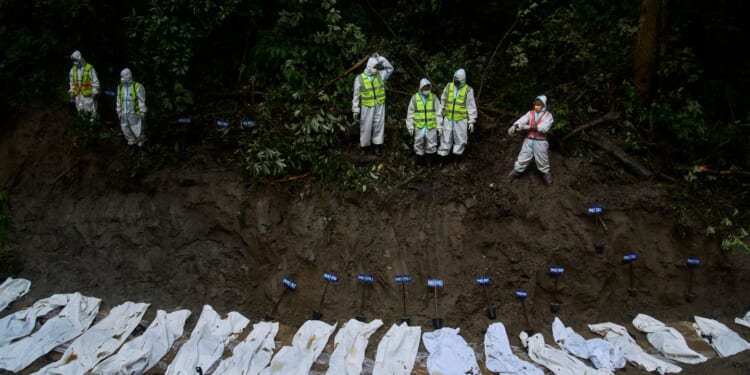 Symbolic funerals held in Nepal for those feared lost as some missing tourists make contact