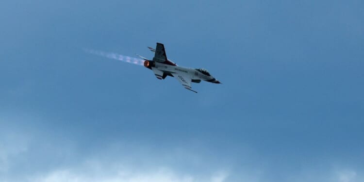 A U.S. Air Force Thunderbird F-16 performs an afterburner pass during the "Salute to America 250" Fourth of July celebrations over the National Mall on July 4, 2026, in Washington, D.C.