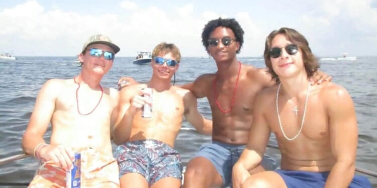 A picture of the late Nolan Wells (second from the right) with friends at Horn Island.