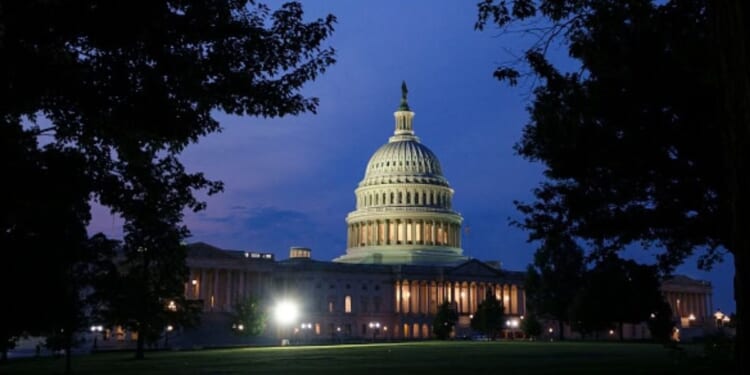 The Capitol building is pictured late at night in Washington, D.C. on April 12, 2026.